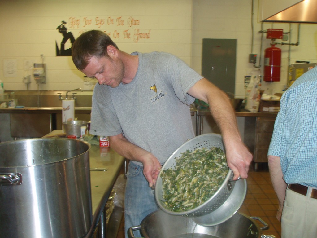 Ryan McClung helps prepare the ramps, which are fried in bacon grease, the day before the Ramp Feed.